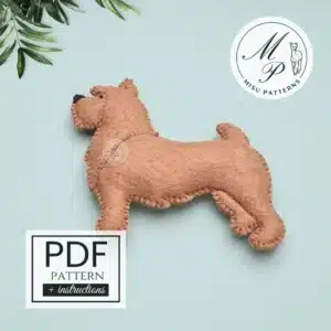 Norwich Terrier felt dog front view light brown with dark brown details